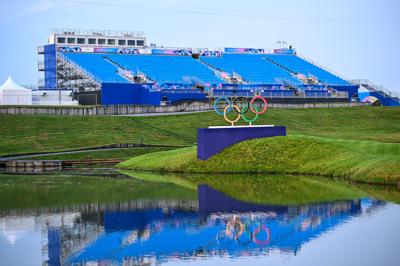 Olympic rings and spectator stands at Le Golf National