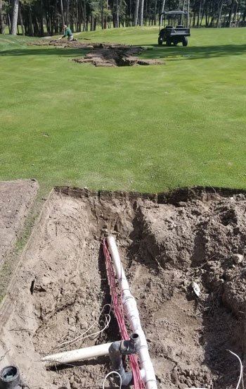 Photo Quiz: Uneven fairway, sizable snow pile Irrigation system repair fairway